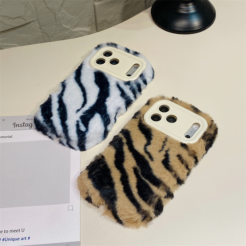 Lüks Zebra Desenli Tüylü Peluş - Apple Iphone 16 incelemesi ve fiyatı